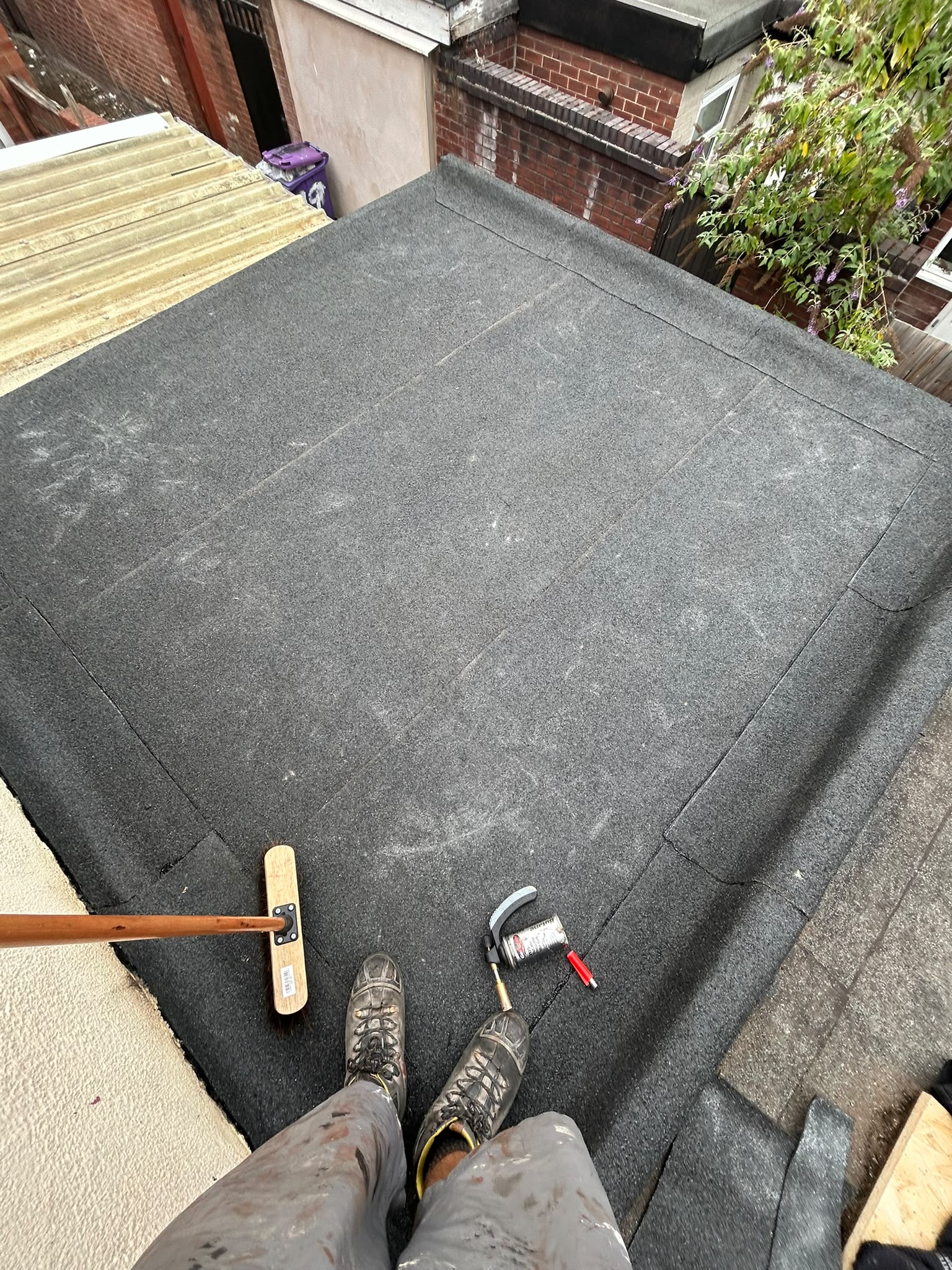 Newly finished torch-on mineral felt flat roof
